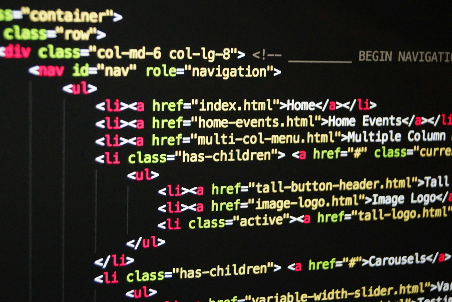 picture-of-html-code HTML code on a dark screen showing nested ul/li navigation markup with colored tags and href links like index.html and home-events.html